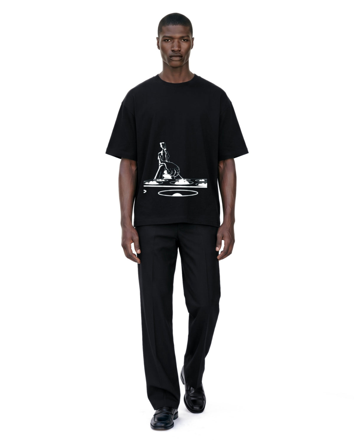 Igisoro Tee on model. Model is 6'3" and wears size XL.